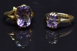Two 9ct gold rings set with amethysts, size N, 8.7g