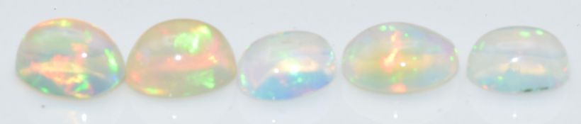 Five loose oval opal cabochons, total approximately 4.45cts