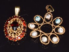 An 18ct gold pendant set with garnets and an 18ct gold pendant set with zircons, 4.7g