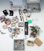 A collection of costume jewellery including silver necklaces, silver rings, silver bangle, silver