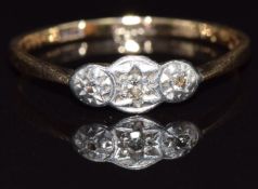 A 9ct gold ring set with three diamonds in a platinum setting, size N, 1.3g