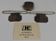 Pair of modern feature hallmarked silver bottle tickets, London 1960 and 1963, maker John Harvey &