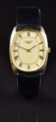 Longines gentleman's wristwatch with black hands and Roman numerals, gold dial, gold plated case and
