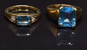 Two 9ct gold rings, one set with an emerald cut blue topaz the other a topaz and diamonds, size N,
