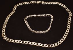 A silver curb link necklace (48cm long) and a silver bracelet, 44g