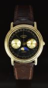 Rotary triple calendar gentleman's wristwatch with moonphase, gold hands, subsidiary dials and