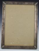 Large silver photograph frame to suit 11 x 8 inch photo, marked sterling, with easel back