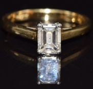 An 18ct gold ring set with an emerald cut diamond of approximately 0.7ct, size K, 3.2g