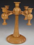 Arts and Crafts turned light oak four branch pedestal candelabra, diameter 32cm, H34cm