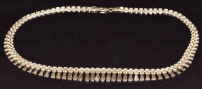 A 9ct gold Cleopatra style necklace, 15.5g