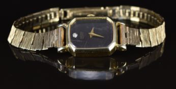 Seiko ladies wristwatch with gold hands, diamond 12 marker, brown dial, gold plated case and