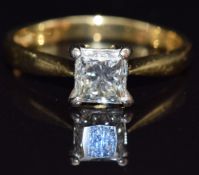 An 18ct gold ring set with a princess cut diamond of approximately 1ct, size L/M, 3.5g