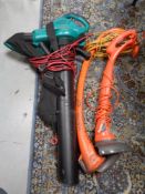 A Bosch garden vacuum together with two Flymo strimmers