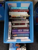 A box of books including autobiographies,