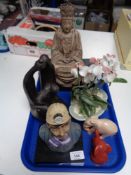 An N Errington figure of a miner, contemporary figures, artificial flower in pot,