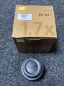 A Nikon AF-S TC-17E II Teleconverter lens, with both caps, boxed.