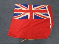 A Naval flag CONDITION REPORT: This measures 223cm by 94cm.