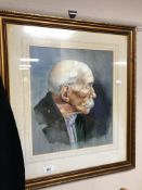 A gilt framed watercolour portrait by J.