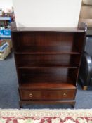 A set of Stag open bookshelves fitted a drawer