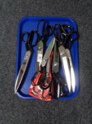 Seven pairs of scissors.