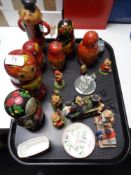 A tray of Russian doll figures, ceramic dish,