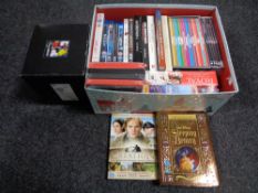 A quantity of DVDs and box sets.