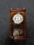 A Comitti of London wall clock