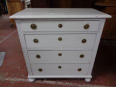 A nineteenth century painted four drawer chest
