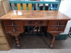 A nineteenth century mahogany writing table