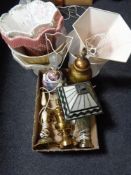 A box of decorative table lamps and shades