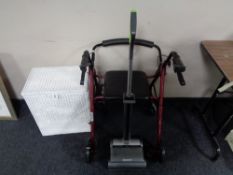 A walking aid together with a G-tech vac and loom box