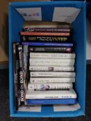 A box of books including The Royal Family,