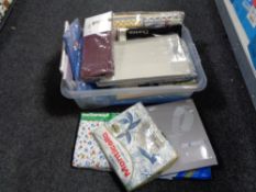 A box of mattress covers, new bedding,