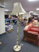 An early twentieth century Japanese style painted wooden standard lamp with shade
