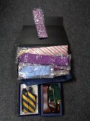 A collection of new gent's ties and braces.