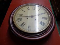A nineteenth century mahogany circular wall clock CONDITION REPORT: 12