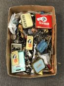 A box containing a quantity of hardware items, tobacco tins etc.