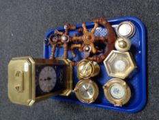 A reproduction Submarine brass clock together with nautical replicas of clocks etc