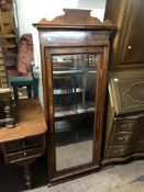 A nineteenth century mahogany bevelled wall mirror