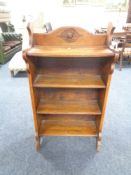 A set of Edwardian oak bookshelves CONDITION REPORT: 61cm wide by 30cm deep by