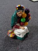 A Royal Doulton figure - The old Balloon seller HN 1315
