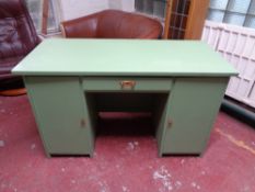 An early twentieth century painted pedestal desk