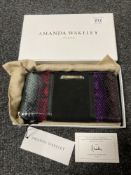An Amanda Wakeley leather clutch purse, in retail dust cover and box.