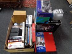A box of books, annuals, DVD's, V-3 racing wheel,