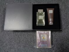 A Lalique gift set comprising of hair and body shower gel and a Lalique Pour Homme natural spray