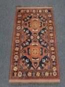 A Caucasian rug,