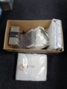 A box of new bedding including Kelly Hoppen,