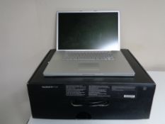 An Apple Power Book G4 laptop with 17