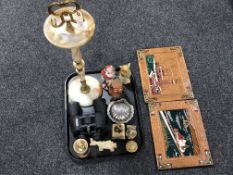 Two brass embossed plaques and a tray of onyx figures, Zenith binoculars 24 x 50,