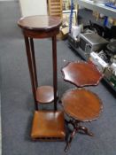 An Edwardian inlaid mahogany circular two tier plant stand together with an Edwardian footstool and